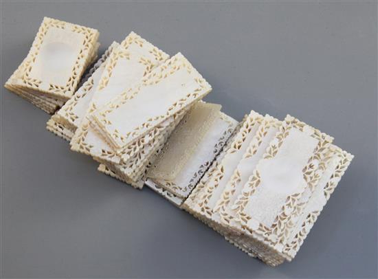 A part set of 56 19th century Chinese mother of pearl gaming counters, in four sizes, Largest 2.75in.